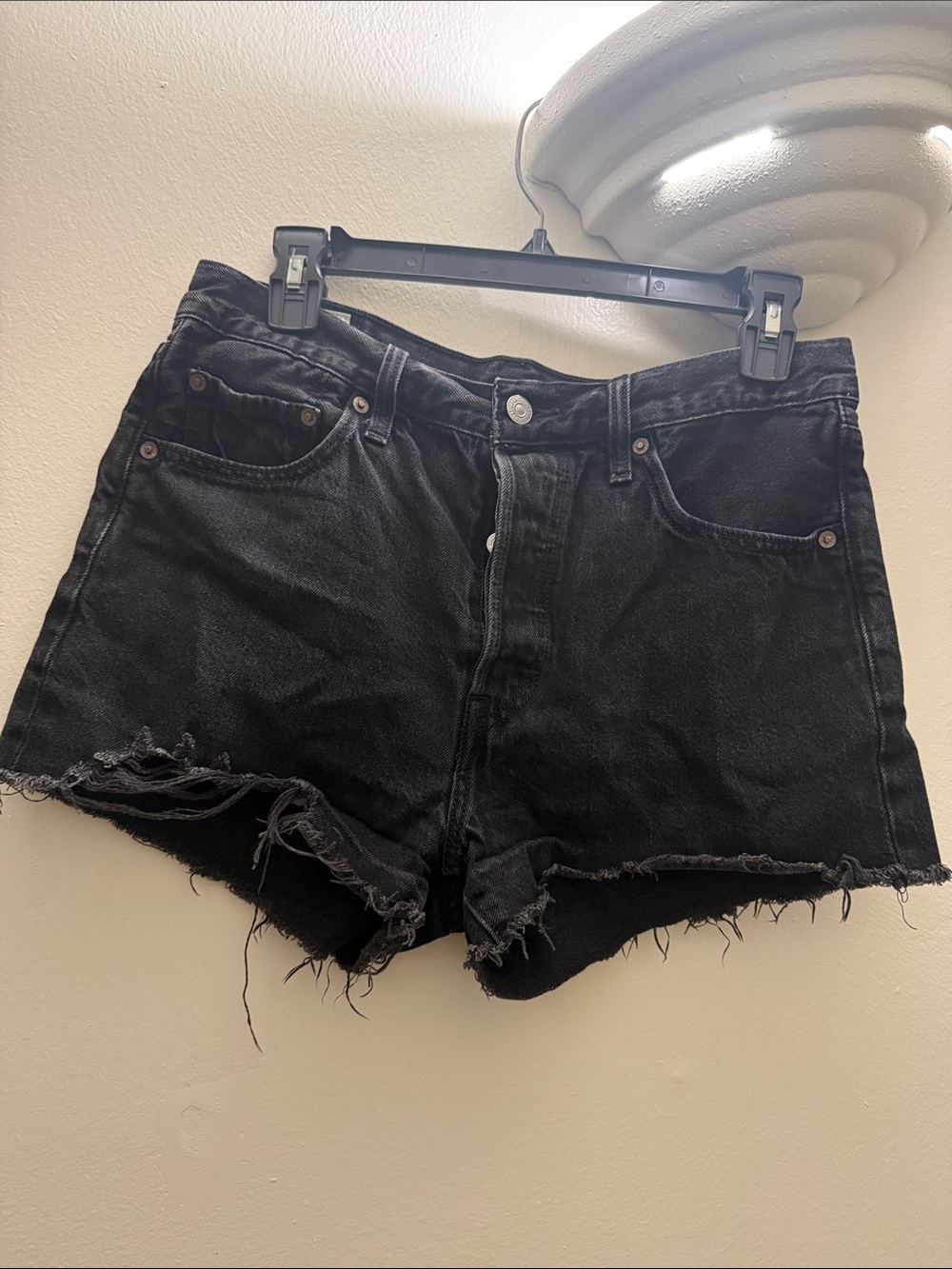 Levi’s Black Distressed High-Rise Denim Shorts